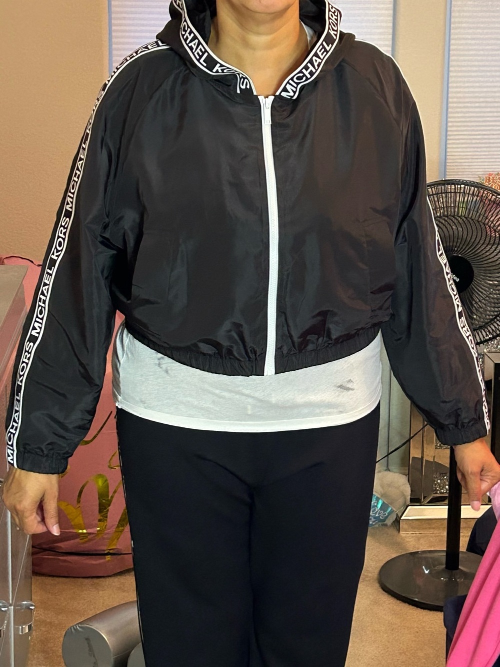 Black Hooded Jacket and Slim jogger-style sweatpants